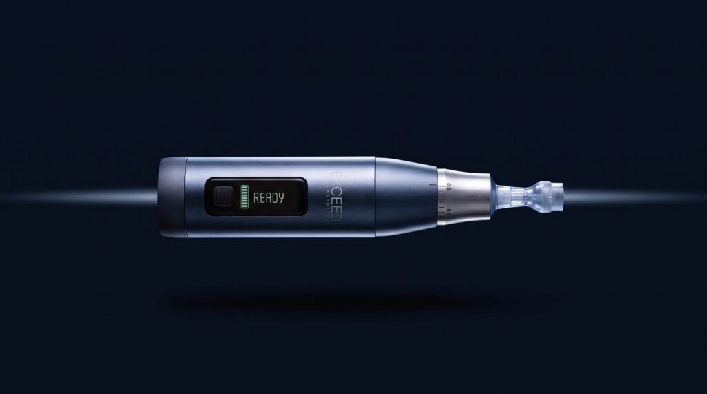 Exceed Unlimited medical microneedling handpiece showing the READY display